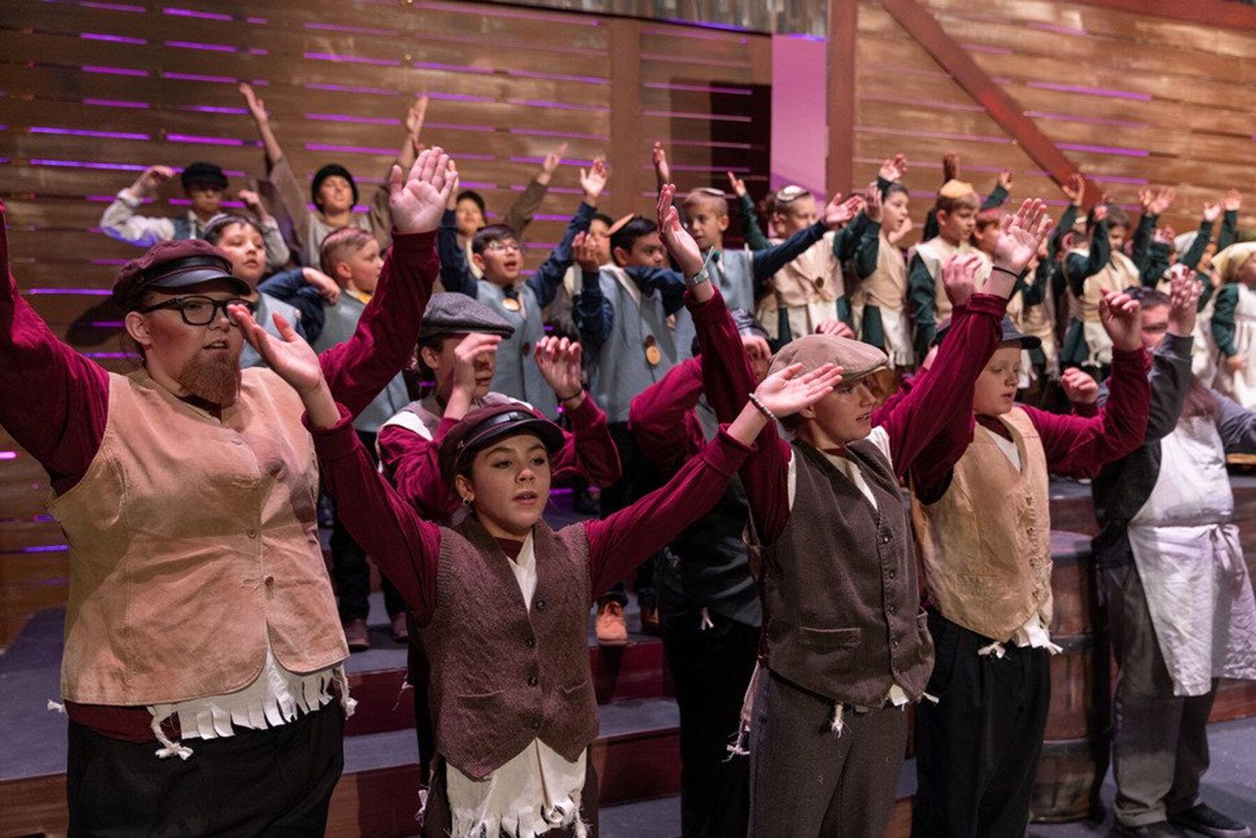 Students performing onstage during the Webb Center summer camp.